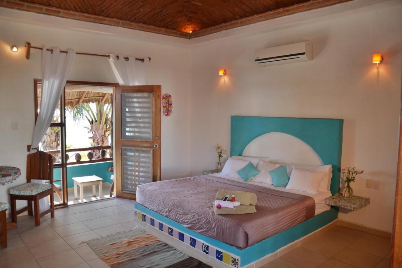 Nacional Beach Club & Bungalows Mahahual Bagian luar foto